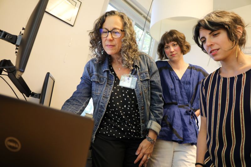 Deborah Cohen, Ph.D., left, and team