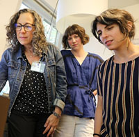 Group of people looking at a computer screen