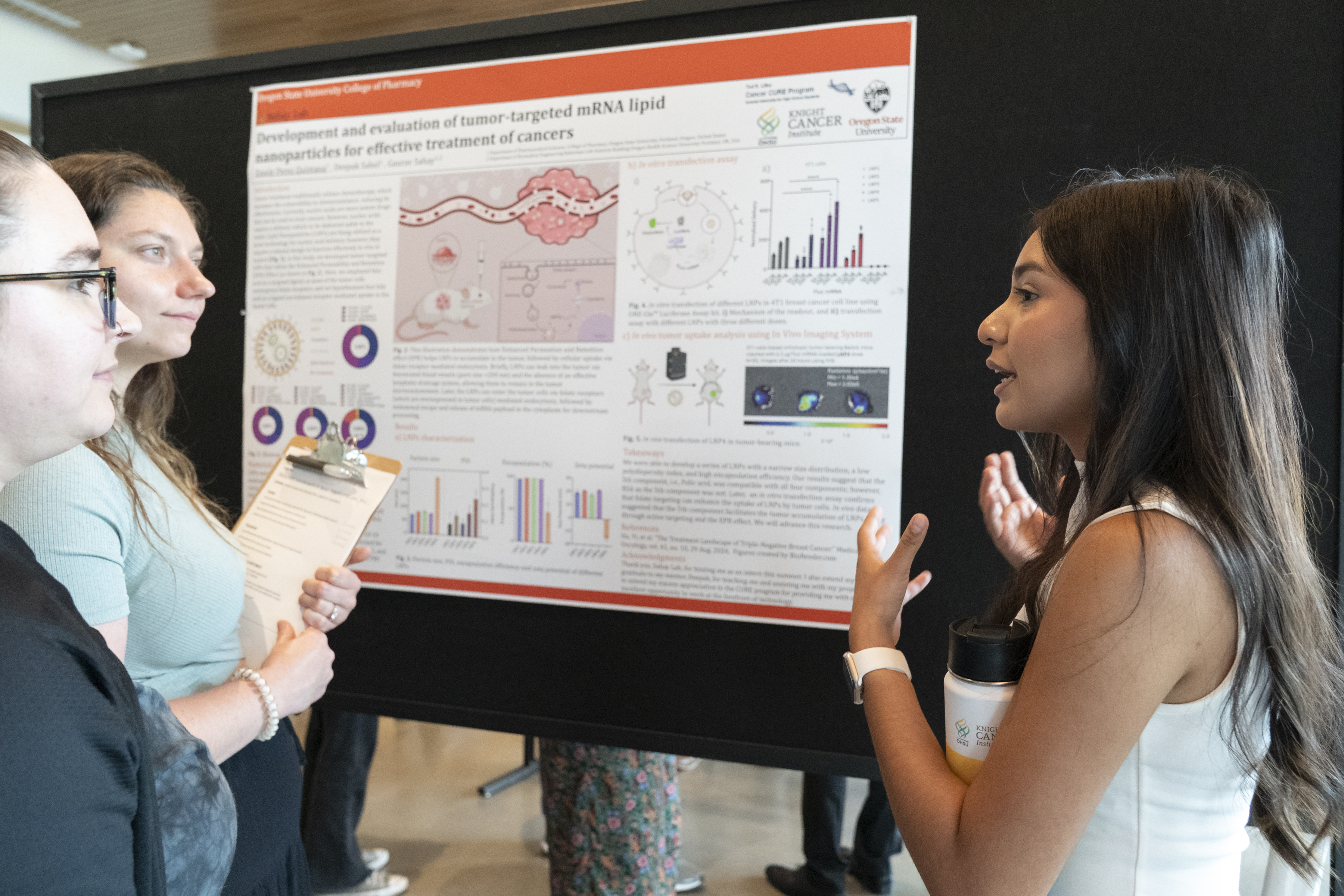 Ted R. Lilley CURE Program intern Emely Perez Quintana presents her research project at the Research Internship Poster Symposium in the Knight Cancer Research Building, 2025