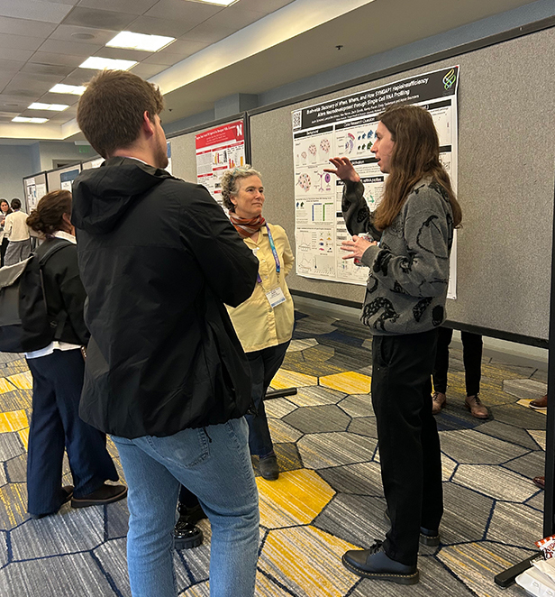 Austin Schubert presents his poster at the Cure SYNGAP1 conference