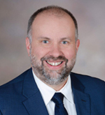Headshot of Mark Lovgren, smiling