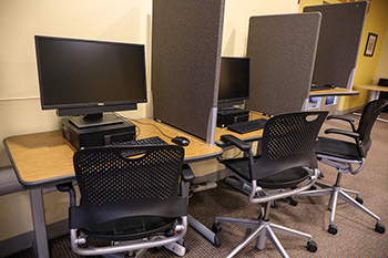 Computer kiosks with privacy screens in the Student Center.