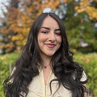 Headshot of Maya Postigo