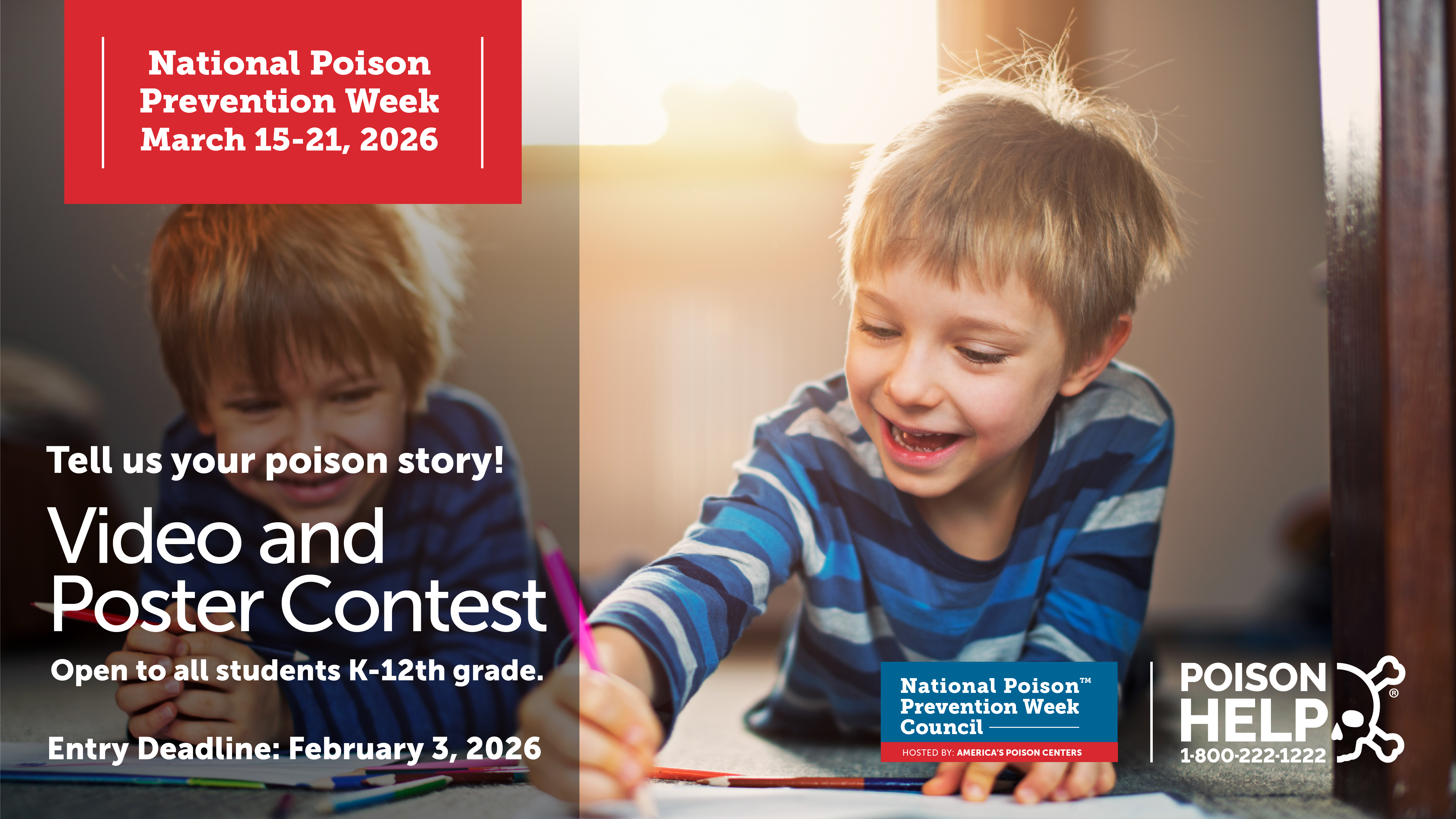 Two children color a poster on the floor.