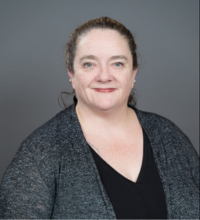 Headshot of Dr. Jessica Flynn, smiling