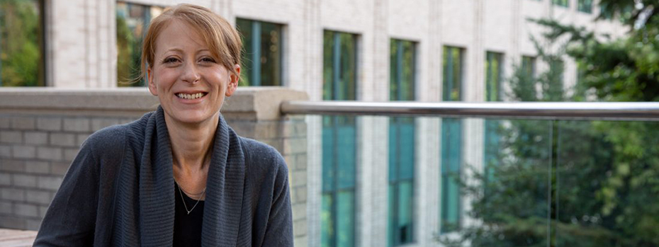 Dr. Silbert is outside smiling into the camera. 