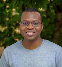 Headshot of Philip Adeniyi