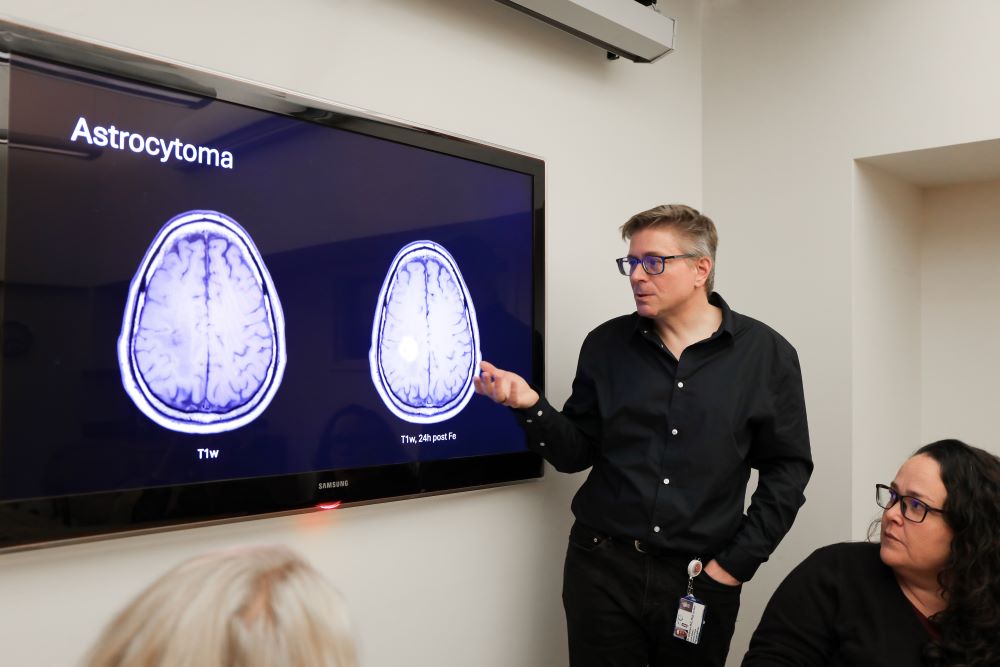 Researchers looking at an image of Astrocytoma