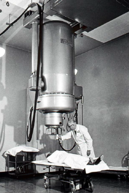 Historical black and white photo of radiation medicine treatment device