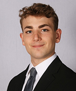 A professional headshot of Barron Smith.