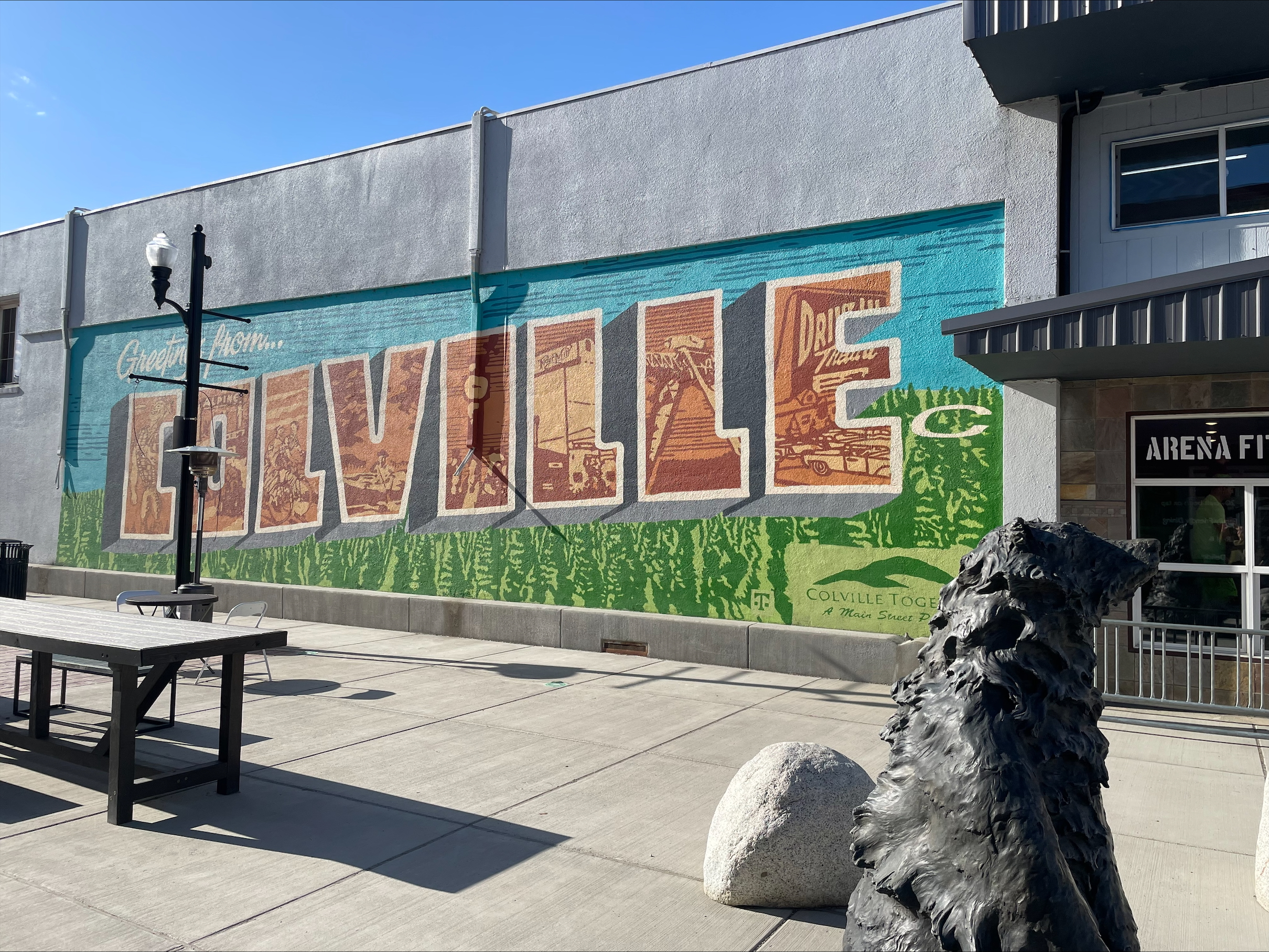 Welcoming painting of the word Colville (WA) on the side of a building. 