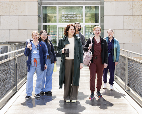 The 2026 maternal-fetal medicine fellows walking in a group.