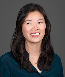 Dr. Angela Jiang smiles for a portrait photo