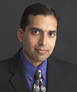 Dr. Raj Kulkarni smiles for a portrait
