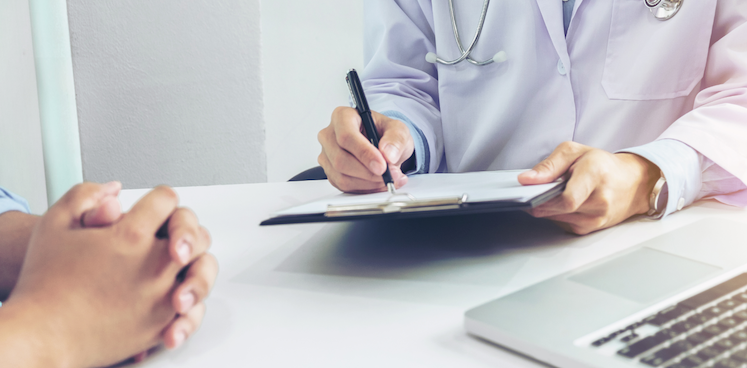 photo of doctor interviewing patient