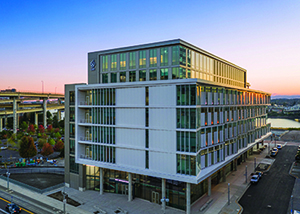 A seven-story building from an aerial perspective.