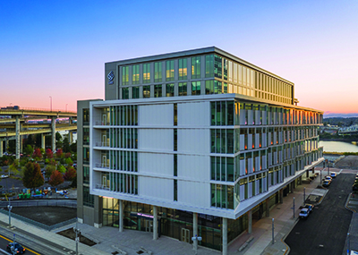 A seven-story building from an aerial perspective.