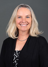 A professional photo of Dr. Andi Traynor