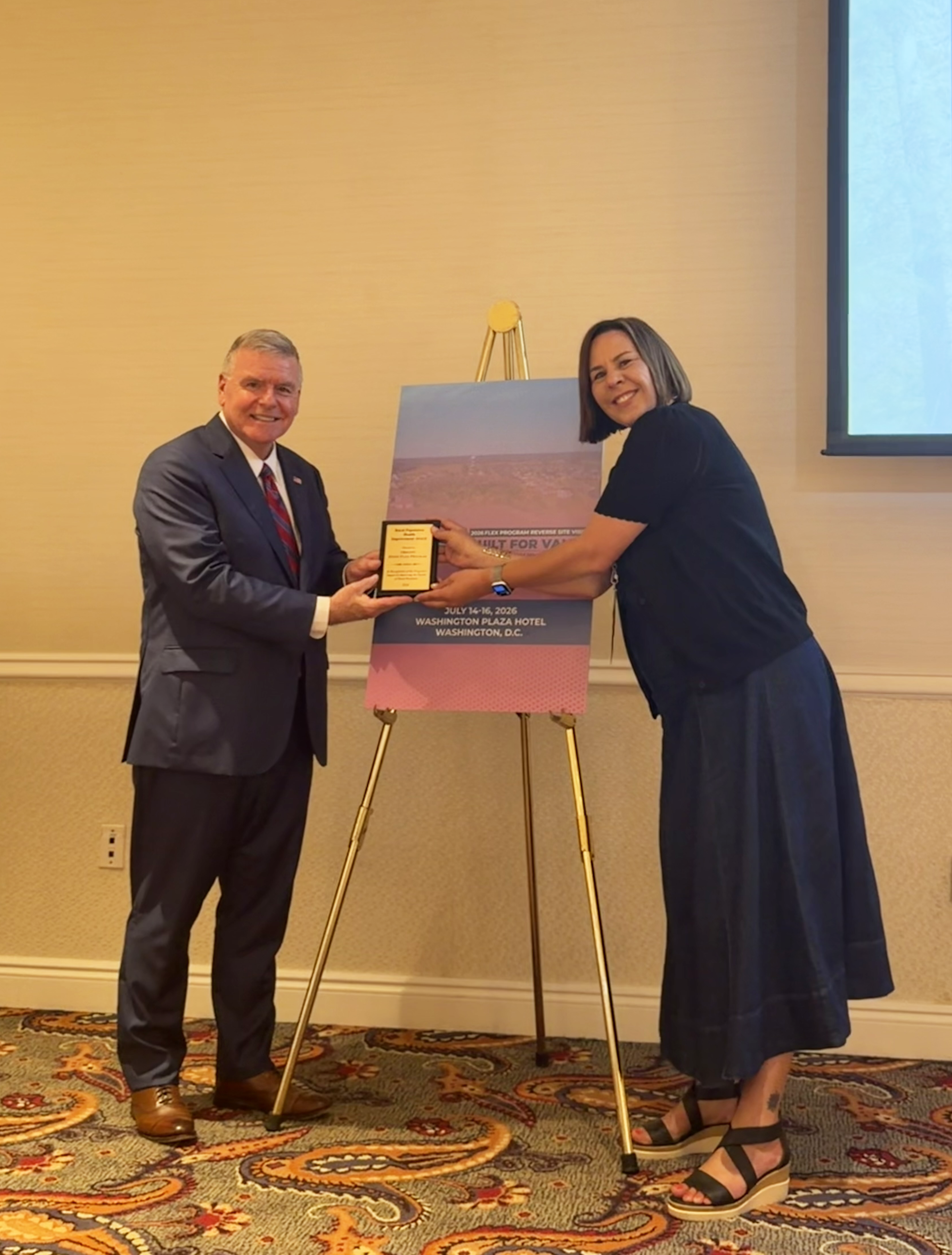Sarah Andersen accepting the population rural health award 2026