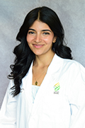 Dr. Shirley Parraga smiles for a portrait photo