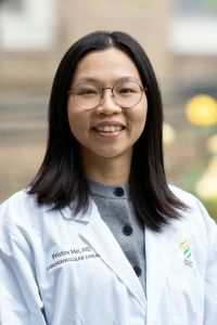 A professional headshot of Dr. Pristine Mei.