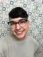 Headshot of person with glasses.