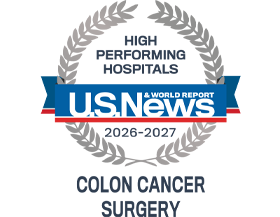 A silver badge that reads "High Performing Hospitals" for "Colon Cancer Surgery" along with the U.S. News & World Report logo and the years 2026-2027.
