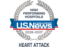 A silver badge that reads "High Performing Hospitals" for "Heart Attack" along with the U.S. News & World Report logo and the years 2026-2027.