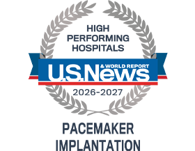 A silver badge that reads "High Performing Hospitals" for "Pacemaker Implantation" along with the U.S. News & World Report logo and the years 2026-2027.