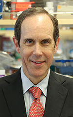 A professional photo of Brian Druker.