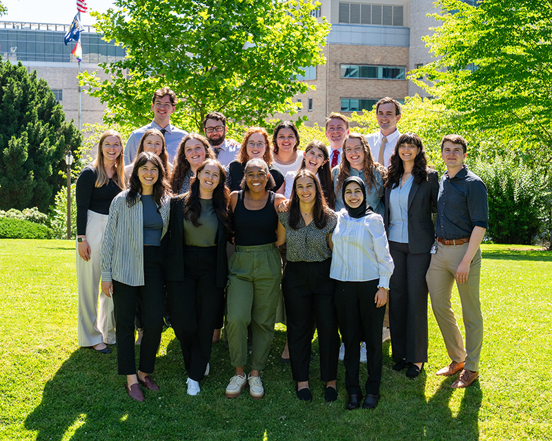 A group photo of 18 people
