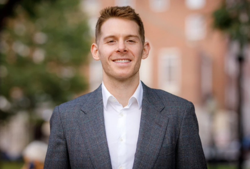 Professional photo of man smiling.