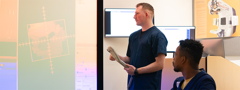 OHSU radiation therapy students learn to use treatment planning and delivery technology during a lab session.