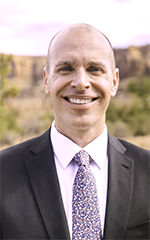 A professional photo of Stephen Petersen.